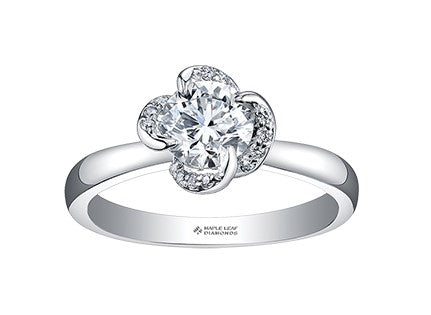 18 Karat Halo Engagement Ring, 0.31 CT Center